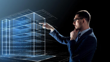 businessman in glasses with virtual construction hologram