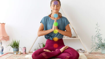 woman meditating in lotus pose